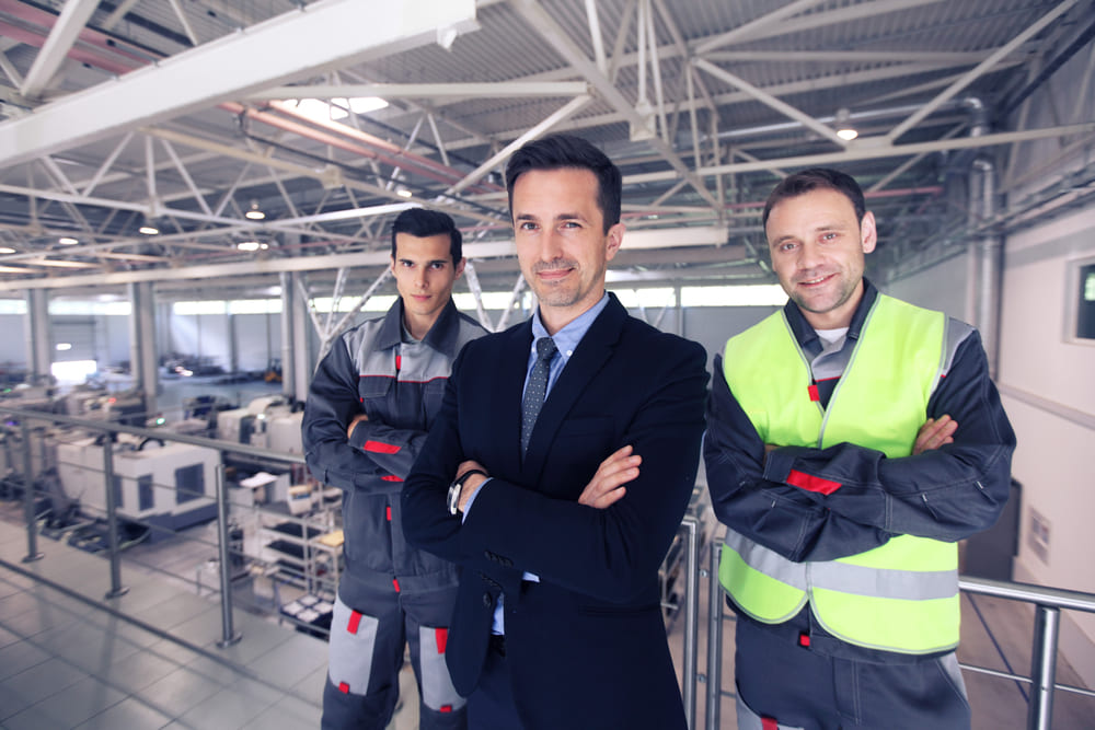 Employees Wearing Corporate Workwear - Hi Vis and Business shirts