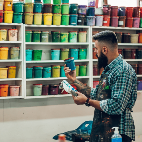 Man choosing color for t shirt printing
