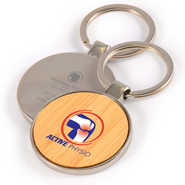Round keychains with logo in heat transfer vinyl & UV print