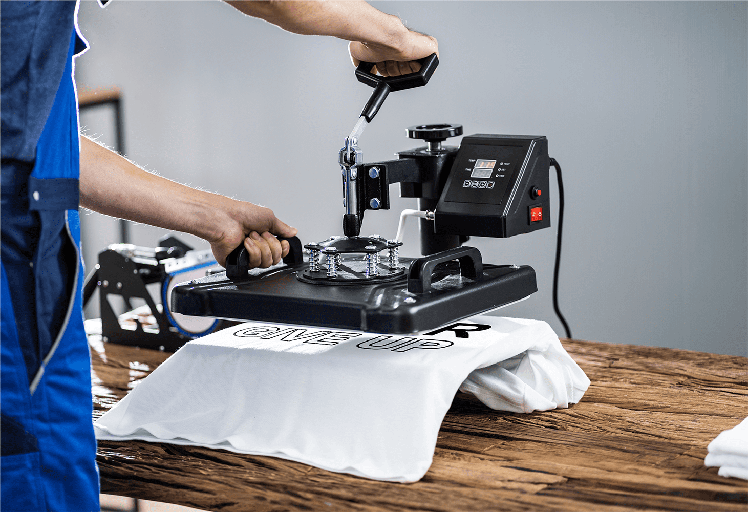 Custom Branded's heat transfer shirt press printing process