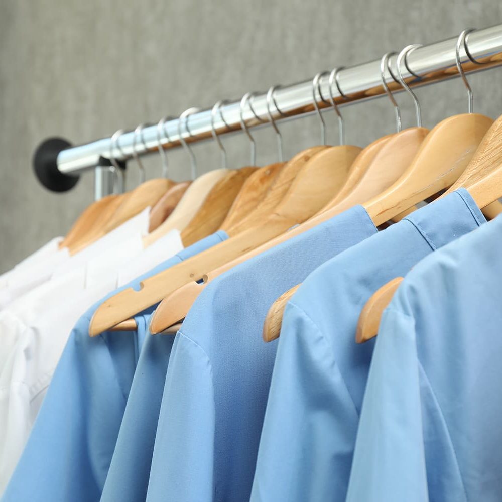 Custom Branded Workwear – Hospitality workwear in a rack Custom Branded Workwear - Hospitality workwear in a rack